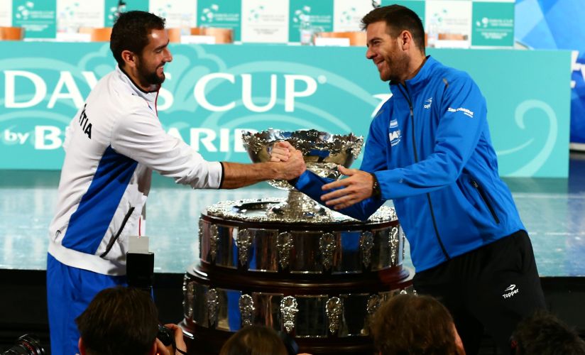 Croatia's Marin Cilic and Argentina's Juan Martin del Potro pose for a picture after the official draw for their Davis Cup final. Reuters