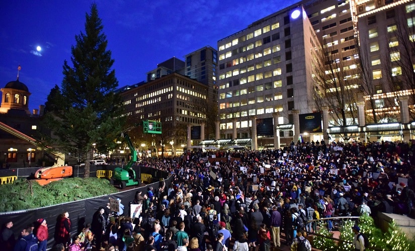Protesters gather in Pioneer Courthouse Square in Portland, Oregon on the third night of protests over the results of the 2016 US presidential election. AP