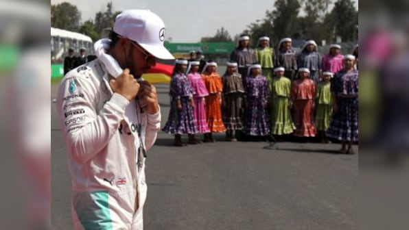 Mexican GP: Lewis Hamilton keeps title bid alive with comfortable victory over Nico Rosberg