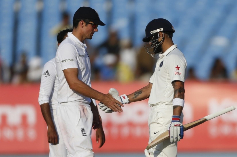 Indian Test captain Virat Kohl with England's captain Alastair Cook. AP