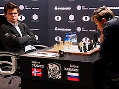 Carlsen presses but held to draw in world chess championship match's first  game - Washington Times