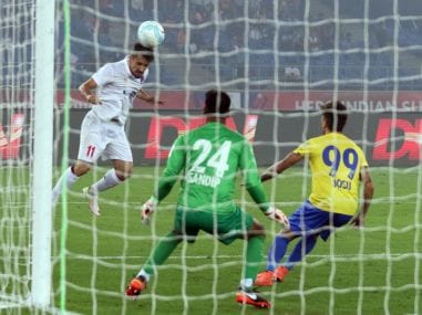 Marcelo Leite Pereira of Delhi Dynamos FC heads the ball for goal against Kerala Blasters. ISL