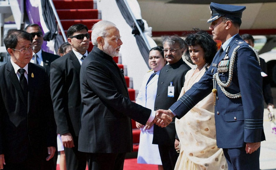Prime Minister Narendra Modi, on his way to Japan, arrived in the Thai capital on Thursday for a brief stopover to pay homage to the late King Bhumibol Adulyadej, the world's longest-ruling monarch, who died last month. (Photos: PTI) Prime Minister Narendra Modi, on his way to Japan, arrived in the Thai capital on Thursday for a brief stopover to pay homage to the late King Bhumibol Adulyadej, the world's longest-ruling monarch, who died last month. (Photos: PTI)