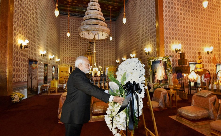 PM Modi laid a wreath and paid his respects to the mortal remains of the late king, whose body has been kept at the Grand Palace complex in Bangkok. (Photo: PTI) PM Modi laid a wreath and paid his respects to the mortal remains of the late king, whose body has been kept at the Grand Palace complex in Bangkok. (Photo: PTI)