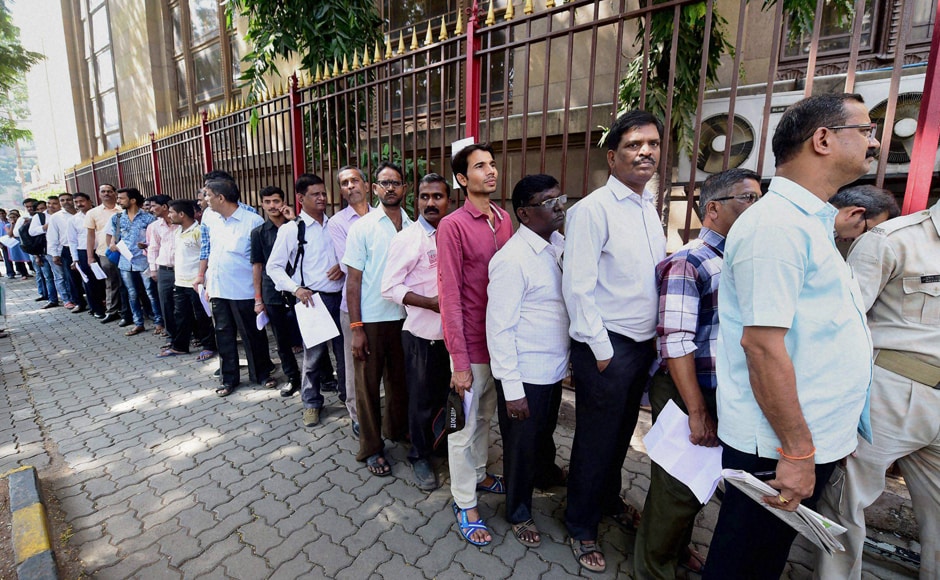 People rushed to Reserve Bank of India branch in Mumbai on Thursday as many ATMs ran out of cash in couple of hours due to heavy rush. PTI People rushed to Reserve Bank of India branch in Mumbai on Thursday as many ATMs ran out of cash in couple of hours due to heavy rush. PTI