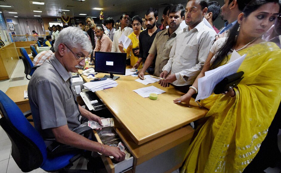 After the government scrapped Rs 500 and Rs 1,000 notes, banks were shut on Wednesday, and ATMs were supposed to be out of service for re calibration on Wednesday and Thursday. The banks reopened on Thursday to a massive increase in footfall as people rushed to get their old currency notes exchanged. PTI After the government scrapped Rs 500 and Rs 1,000 notes, banks were shut on Wednesday, and ATMs were supposed to be out of service for re calibration on Wednesday and Thursday. The banks reopened on Thursday to a massive increase in footfall as people rushed to get their old currency notes exchanged. PTI