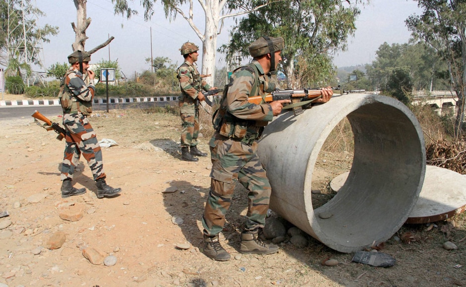 The number of casualties in the Nagrota Army Headquarter attack has risen to seven as two officers and five jawans lost their lives. Security personnel take positions during a gun battle with suspected militants near Jammu on Tuesday. (Photo: PTI) The number of casualties in the Nagrota Army Headquarter attack has risen to seven as two officers and five jawans lost their lives. Security personnel take positions during a gun battle with suspected militants near Jammu on Tuesday. (Photo: PTI)