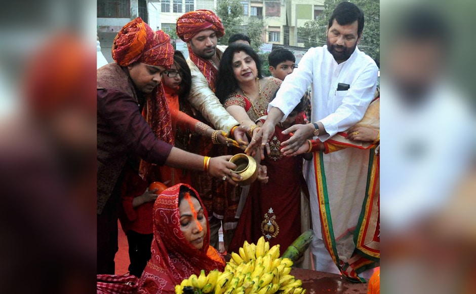 Union Minister Ram Vilas Paswan, his wife and son and MP Chirag Paswan performing rituals on the occasion of the Chhath festival in Patna on Sunday. PTI Union Minister Ram Vilas Paswan, his wife and son and MP Chirag Paswan performing rituals on the occasion of the Chhath festival in Patna on Sunday. PTI