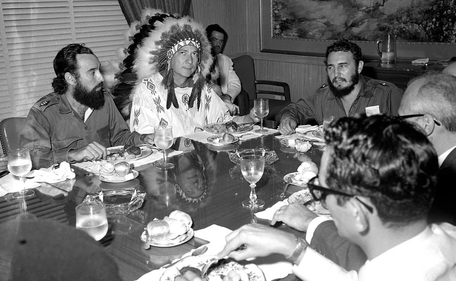 Fidel Castro (R) meets with Reverend WA Raifford (2nd-L), chief of the White Birds from the Creek Indians in Havana, 16 July, 1959. Raifford gave Castro the name Spiheechie Meeko (Big Warrior Chief). The bearded, cigar-puffing leader, renowned for trademark army fatigues and hours-long public tirades, grabbed power in a January 1, 1959 revolution. Living by the slogan Fidel Castro (R) meets with Reverend WA Raifford (2nd-L), chief of the White Birds from the Creek Indians in Havana, 16 July, 1959. Raifford gave Castro the name Spiheechie Meeko (Big Warrior Chief). The bearded, cigar-puffing leader, renowned for trademark army fatigues and hours-long public tirades, grabbed power in a January 1, 1959 revolution. Living by the slogan