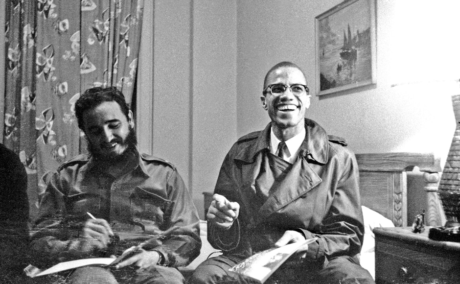 Fidel Castro shares a laugh with Malcolm X at the Hotel Theresa in New York, 19 October, 1960. In April 1961, he weathered an invasion attempt by some 1,300 CIA-trained Cuban exiles at the Bay of Pigs. Reuters Fidel Castro shares a laugh with Malcolm X at the Hotel Theresa in New York, 19 October, 1960. In April 1961, he weathered an invasion attempt by some 1,300 CIA-trained Cuban exiles at the Bay of Pigs. Reuters