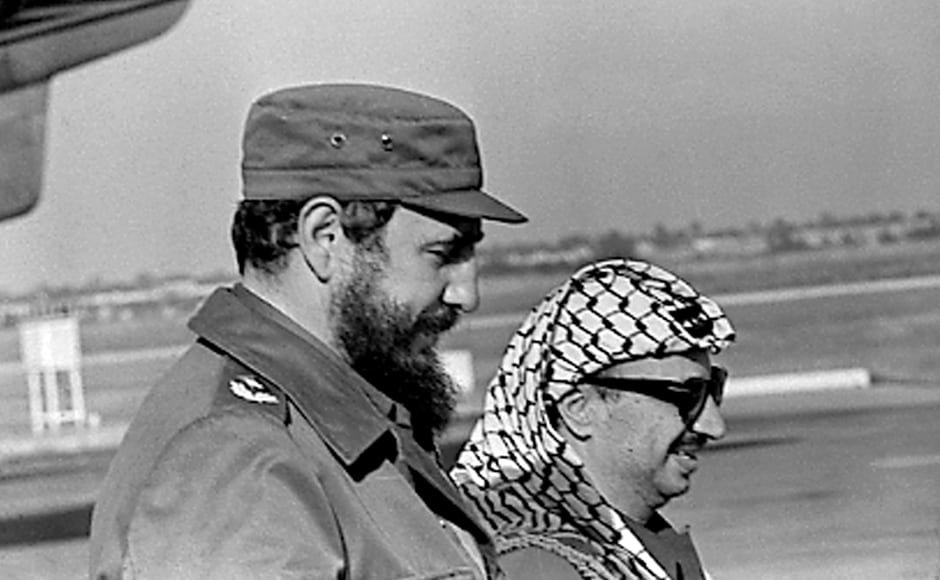 Fidel Castro (L) and PLO leader Yasser Arafat stand together at the airport in Havana during Arafat's first visit to Cuba on 14 November, 1974. Castro strode the world stage as a communist icon when the Cold War was at its height. He sent 15,000 soldiers to help Soviet-backed troops in Angola in 1975 and dispatched forces to Ethiopia in 1977. Reuters Fidel Castro (L) and PLO leader Yasser Arafat stand together at the airport in Havana during Arafat's first visit to Cuba on 14 November, 1974. Castro strode the world stage as a communist icon when the Cold War was at its height. He sent 15,000 soldiers to help Soviet-backed troops in Angola in 1975 and dispatched forces to Ethiopia in 1977. Reuters
