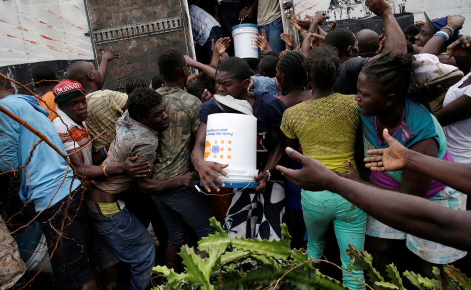 However, international specialists say many communities right along shorelines still aren't getting adequate supplies. Reuters However, international specialists say many communities right along shorelines still aren't getting adequate supplies. Reuters