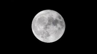 Supermoon lights up night sky as the world looks up to gaze at the unique celestial event