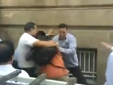 Tata security staff beats up photojournalists at company headquarters, Bombay House Tata security staff beats up photojournalists at company headquarters, Bombay House