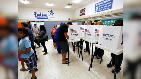 In divisive election year, Asian Americans early voter turnout at record level