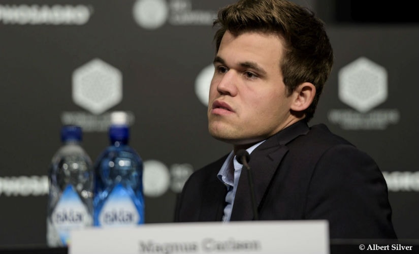 A dejected Carlsen after his first defeat in the ongoing World Championships. Image courtesy: Albert Silver.