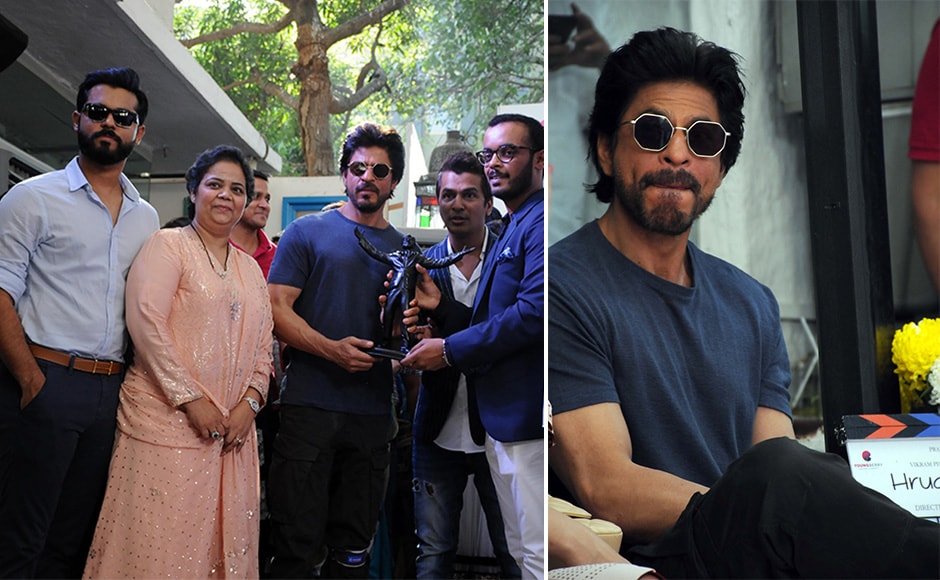 The mahurat of Marathi film 'Hrudayantar', which marks the filmmaking debut of ace fashion designer Vikram Phadnis took place at a suburban lounge in Mumbai over the 10-11 December weekend. Superstar Shah Rukh Khan was the guest of honour at the event. Images by Sachin Gokhale / Firstpost The mahurat of Marathi film 'Hrudayantar', which marks the filmmaking debut of ace fashion designer Vikram Phadnis took place at a suburban lounge in Mumbai over the 10-11 December weekend. Superstar Shah Rukh Khan was the guest of honour at the event. Images by Sachin Gokhale / Firstpost