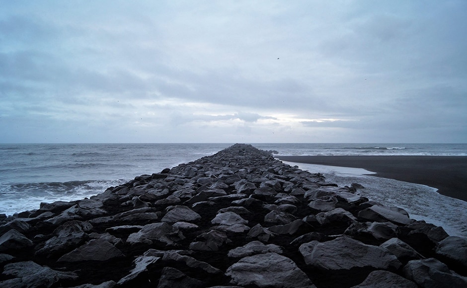 A dike leading into the sea. Photo credit: Alok Raj A dike leading into the sea. Photo credit: Alok Raj