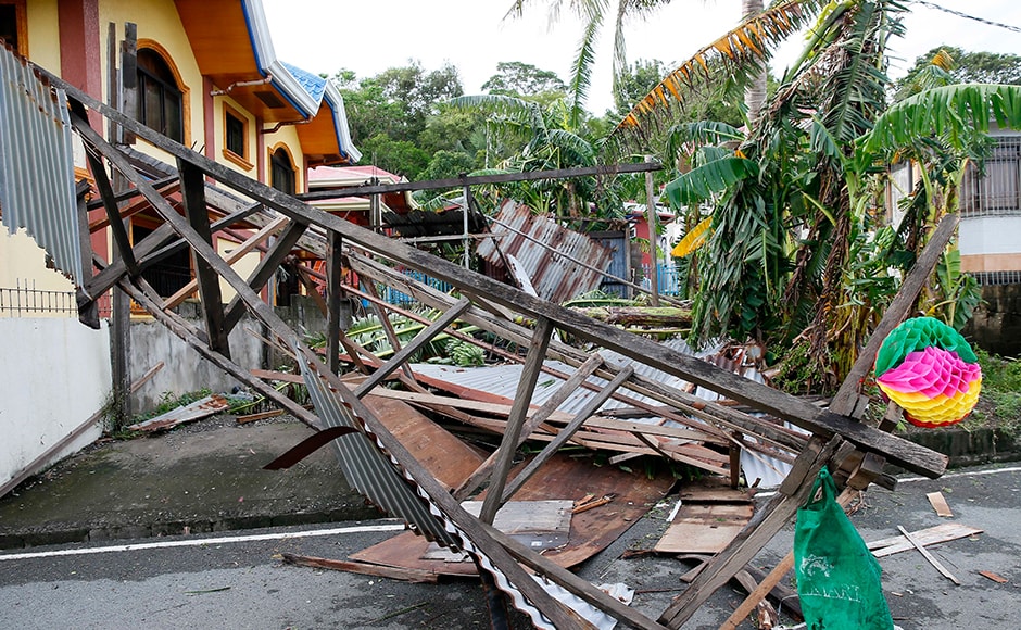 Officials said that Typhoon Nock-Ten had led to power crisis in five provinces as well as displacing thousands of villagers and travelers in Asia's Catholic bastion.(AP Photo) Officials said that Typhoon Nock-Ten had led to power crisis in five provinces as well as displacing thousands of villagers and travelers in Asia's Catholic bastion.(AP Photo)
