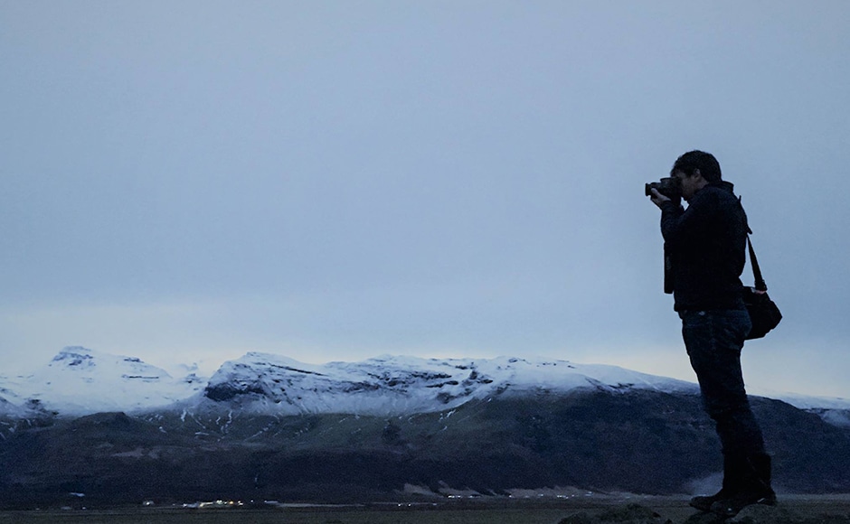 Photographing a glacier pouring out from between two mountains. Photo credit: Alok Raj Photographing a glacier pouring out from between two mountains. Photo credit: Alok Raj