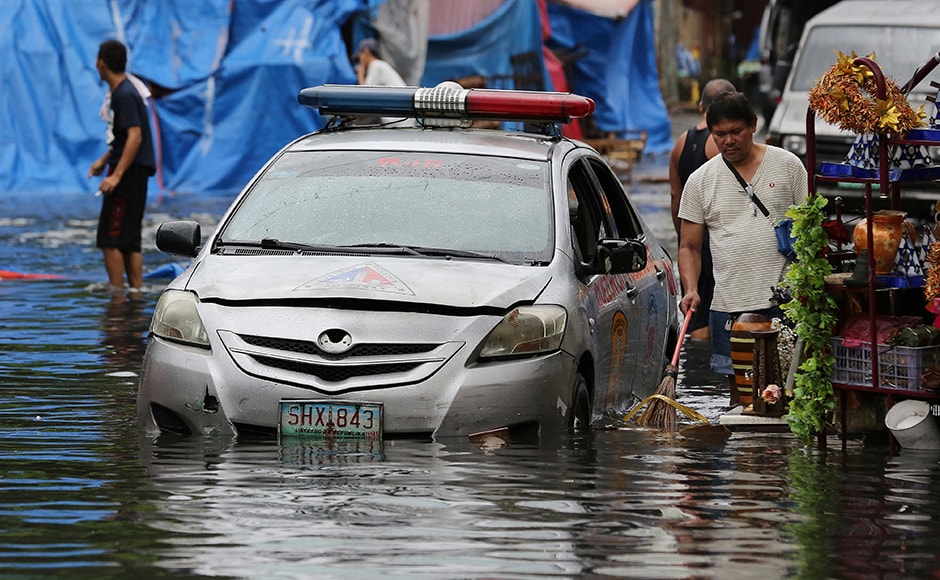 The tropical storm dampened the Christmas spirit as over 300,000 people in the country spent their Christmas in emergency shelters (AP Photo) The tropical storm dampened the Christmas spirit as over 300,000 people in the country spent their Christmas in emergency shelters (AP Photo)