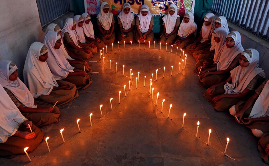 School girls light candles in the shape of a ribbon during a HIV/AIDS awareness campaign ahead of World Aids Day, in Ahmedabad, India November 30, 2016. The WHO report cites worrying numbers, when it comes to awareness about the disease in young girls. Fewer than one in every five girls between 15 years and 19 years of age are aware of their HIV status, the report said. Reuters School girls light candles in the shape of a ribbon during a HIV/AIDS awareness campaign ahead of World Aids Day, in Ahmedabad, India November 30, 2016. The WHO report cites worrying numbers, when it comes to awareness about the disease in young girls. Fewer than one in every five girls between 15 years and 19 years of age are aware of their HIV status, the report said. Reuters