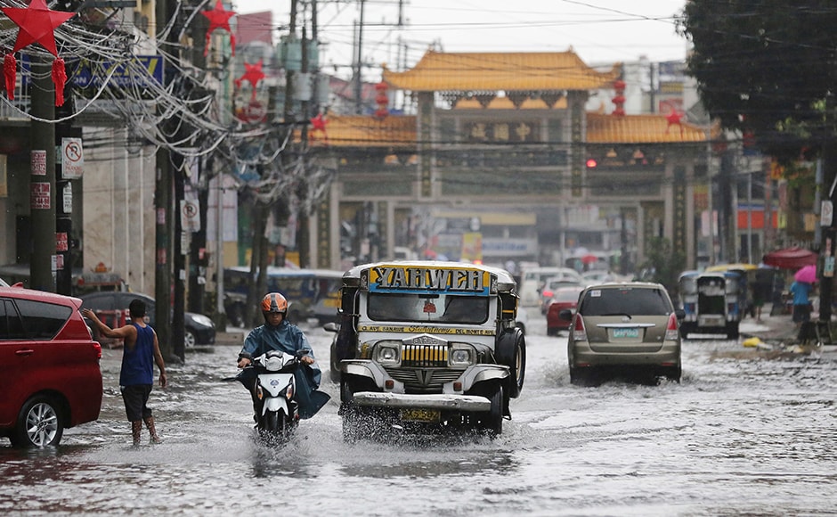 Typhoon Nock-Ten is known locally as Nina. The tropical storm left people without power as fierce winds knocked out electricity for lots of people in different parts of the Philippines.(AP Photo) Typhoon Nock-Ten is known locally as Nina. The tropical storm left people without power as fierce winds knocked out electricity for lots of people in different parts of the Philippines.(AP Photo)