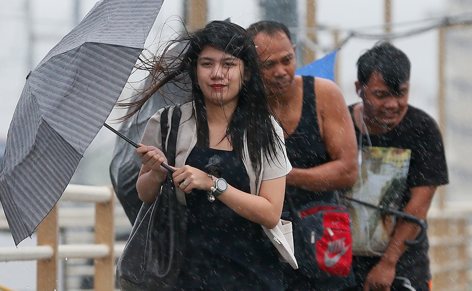 11,476 passengers, more than 1,000 cargo ships and over a dozen other vessels were stranded in various ports in the region, the Philippines National Disaster Risk Reduction and Management Council reported on Sunday.(AP Photo) 11,476 passengers, more than 1,000 cargo ships and over a dozen other vessels were stranded in various ports in the region, the Philippines National Disaster Risk Reduction and Management Council reported on Sunday.(AP Photo)