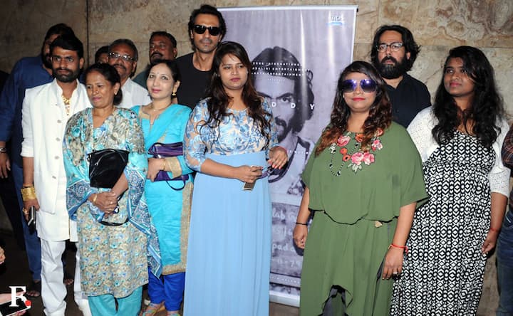 At the teaser launch of Daddy; Arjun Rampal poses with Arun Gawli's family