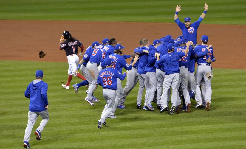 Chicago Cubs players celebrate on the field after defeating the Cleveland Indians in game seven of the 2016 World Series. Reuters
