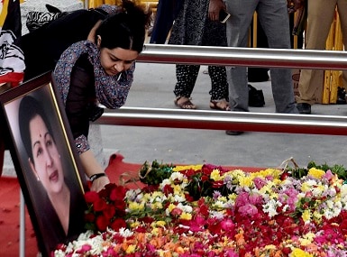 Former Tamil Nadu Chief Minister Jayalalithaa's niece Deepa Jayakumar pays floral tribute at her burial place in Chennai on 7 December. PTI