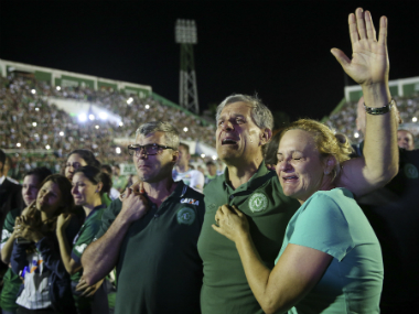 Chapecoense plane crash: Fans flood home stadium to pray for players Chapecoense plane crash: Fans flood home stadium to pray for players
