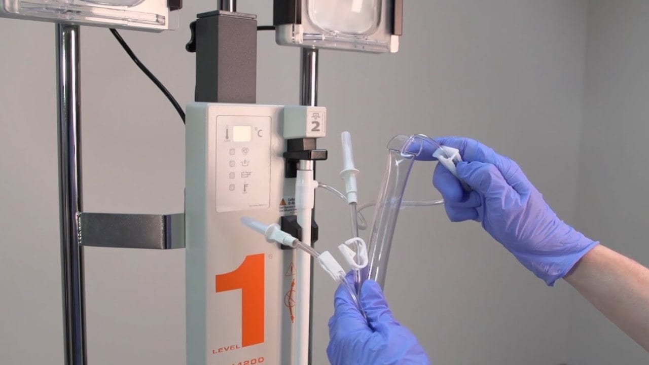 A fluid warmer being prepared for use.