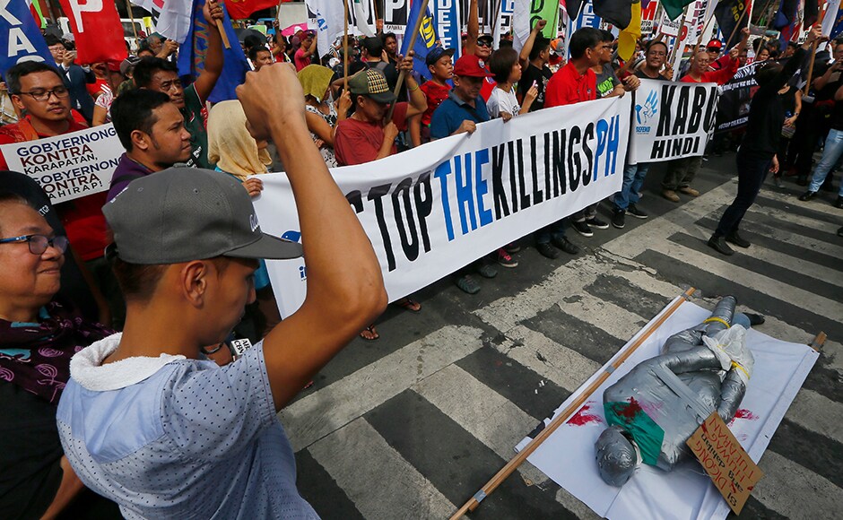 Protesters display a stuffed figure to symbolize the victims of extra-judicial killings in the country during a rally near the Presidential Palace to mark International Human Rights Day Saturday, 10 December, 2016 in Manila, Philippines. AP Protesters display a stuffed figure to symbolize the victims of extra-judicial killings in the country during a rally near the Presidential Palace to mark International Human Rights Day Saturday, 10 December, 2016 in Manila, Philippines. AP