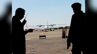 Indonesia authorities recover body parts after plane carrying 13 went missing