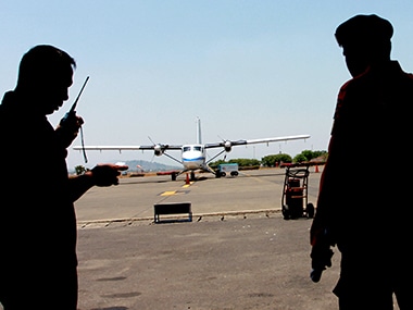 Indonesia authorities recover body parts after plane carrying 13 went missing
