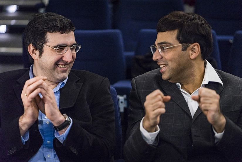 Two former World Champions, Vladimir Kramnik and Viswanathan Anand, spend a light moment together before the fifth round. (image courtesy: Lennart Ootes)
