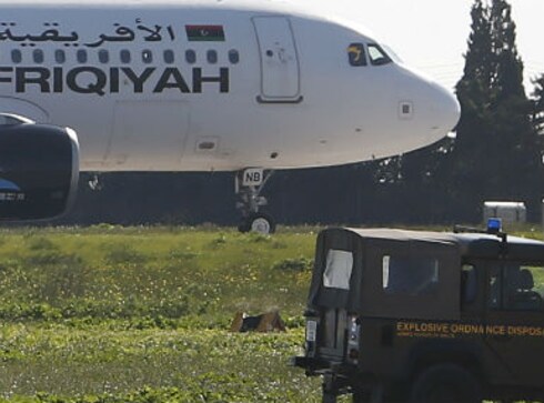 Scare averted as Libyan aircraft hijackers release passengers at Malta airport, surrender Scare averted as Libyan aircraft hijackers release passengers at Malta airport, surrender