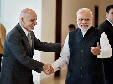 Prime Minister Narendra Modi and President of Afghanistan Ashraf Ghani shake hands at 6th Heart of Asia Conference in Amritsar on Sunday. PTI
