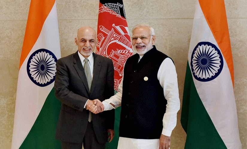 Prime Minister Narendra Modi and President of Afghanistan Ashraf Ghani shake hands at 6th Heart of Asia Conference in Amritsar on Sunday. PTI