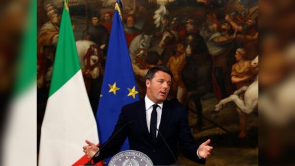 Italian PM Matteo Renzi resigns, hints at early election