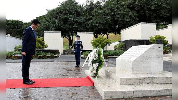 Shinzo Abe at Pearl Harbor: Japanese prime minister pays respect to war dead