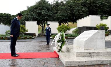 Shinzo Abe at Pearl Harbor: Japanese prime minister pays respect to war dead