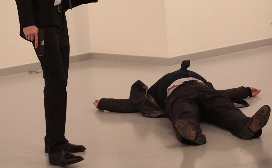 The ambassador, Andrei Karlov, was several minutes into a speech at the embassy-sponsored exhibition in the capital, Ankara, when a man wearing a suit and tie shouted The ambassador, Andrei Karlov, was several minutes into a speech at the embassy-sponsored exhibition in the capital, Ankara, when a man wearing a suit and tie shouted