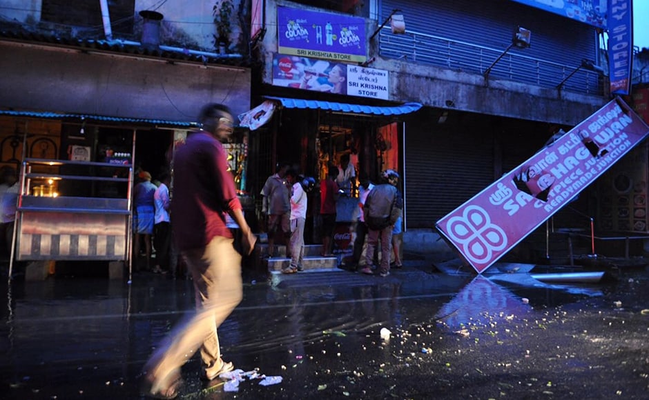 A man walks along a flooded street in Chennai as Cyclone Vardah approaches the Indian coast on 12 December. Authorities started evacuating thousands of people from fishing villages as Cyclone Vardah barrelled towards its southeastern coast at speeds of more than 100 kilometres (62 miles) per hour. AFP A man walks along a flooded street in Chennai as Cyclone Vardah approaches the Indian coast on 12 December. Authorities started evacuating thousands of people from fishing villages as Cyclone Vardah barrelled towards its southeastern coast at speeds of more than 100 kilometres (62 miles) per hour. AFP