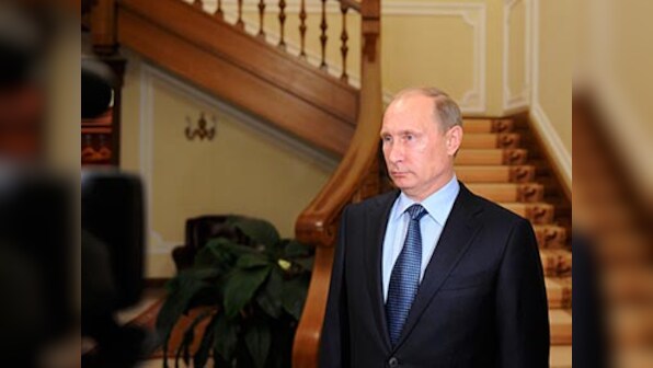 Russia's Vladimir Putin hails Aleppo recapture, moves to expand Syria presence