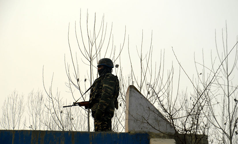 A soldier on patrol during the operation in Anantnag. Firstpost/Sameer Yasir
