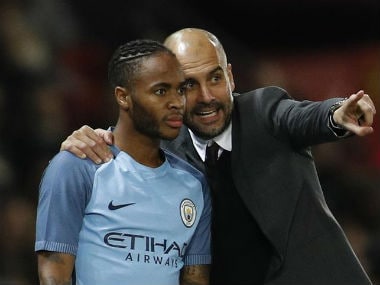 File photo of Pep Guardiola (R) and Raheem Sterling. Reuters
