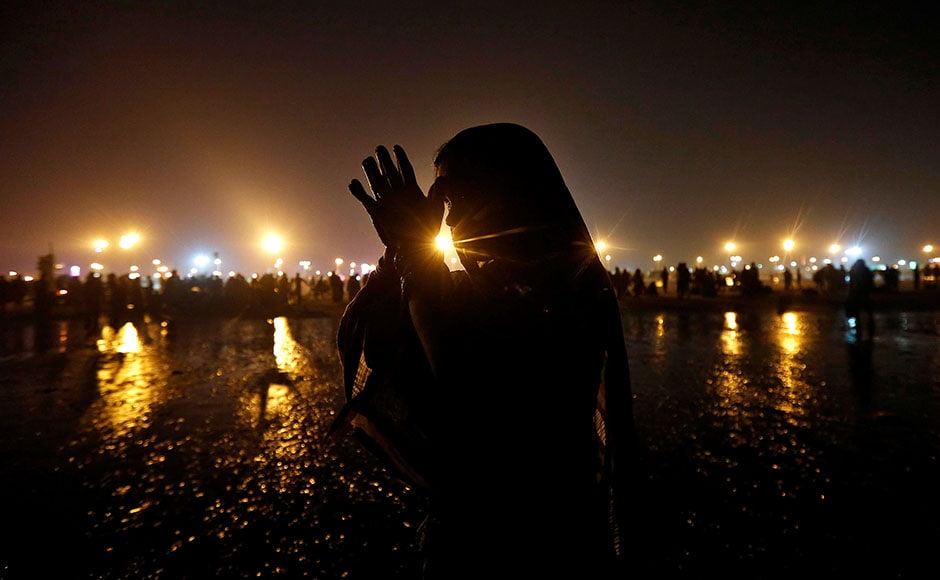 A Hindu pilgrim offers prayers after taking a dip in the Ganges river ahead of the one-day festival of Makar Sankranti, at Sagar Island, south of Kolkata, on 13 January, 2017. Reuters A Hindu pilgrim offers prayers after taking a dip in the Ganges river ahead of the one-day festival of Makar Sankranti, at Sagar Island, south of Kolkata, on 13 January, 2017. Reuters