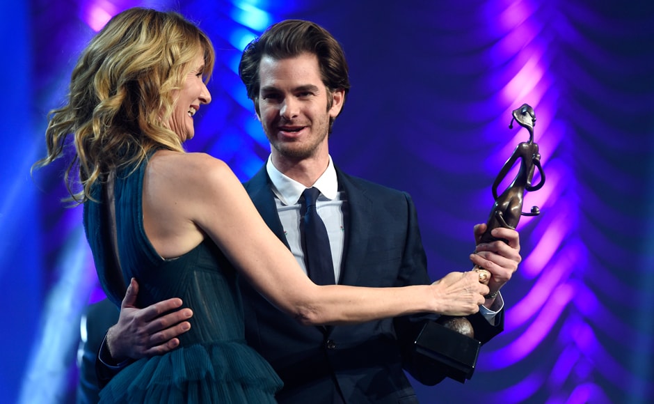 Laura Dern, left, presents the spotlight award to Andrew Garfield for 'Hacksaw Ridge' at the 28th annual Palm Springs International Film Festival Awards Gala on Monday, 2 January 2017, California. AP Photo Laura Dern, left, presents the spotlight award to Andrew Garfield for 'Hacksaw Ridge' at the 28th annual Palm Springs International Film Festival Awards Gala on Monday, 2 January 2017, California. AP Photo